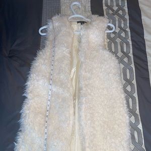 White faux fur vest